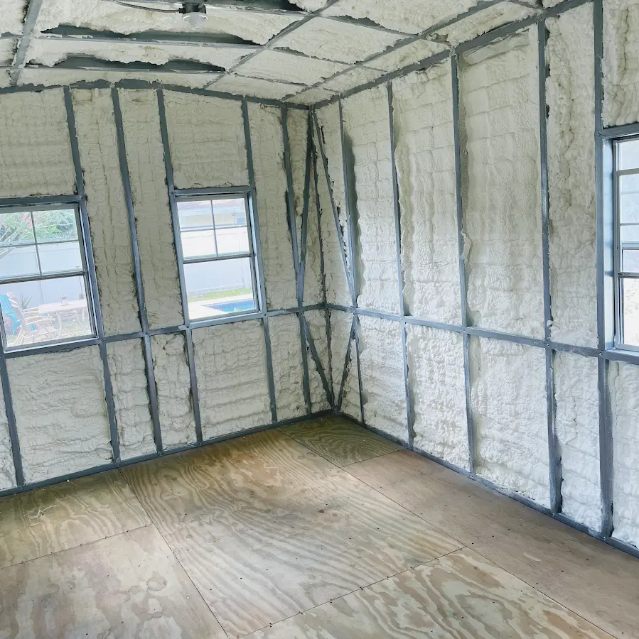 Closed-cell spray foam insulation applied to wall cavities in a residential project in Webb City